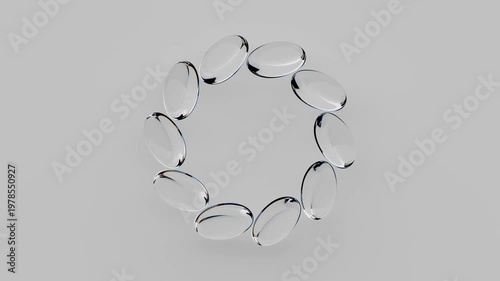 Clear objects rotating in a circular pattern over time