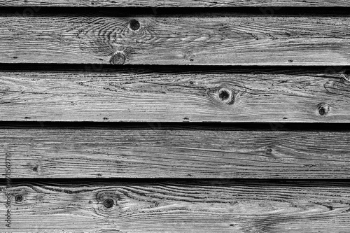 Quadro su tela A horizontal background of old, real wooden planks, parallel to each other
