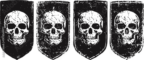 Four grunge medieval shields with white skull emblems in black background