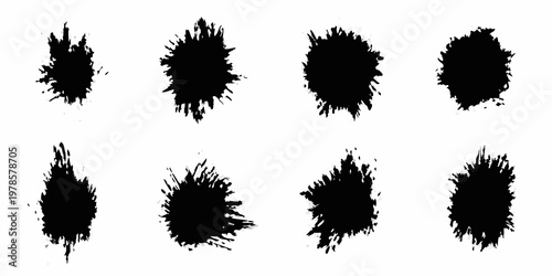 Collection of abstract black ink splatters and brushstroke shapes