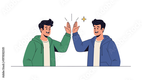 Two happy young men wearing green and blue hoodies giving each other a high five to celebrate success and friendship.