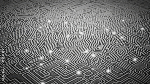 Intricate black and white circuit board with glowing points of light illuminating the complex pathways and connections.