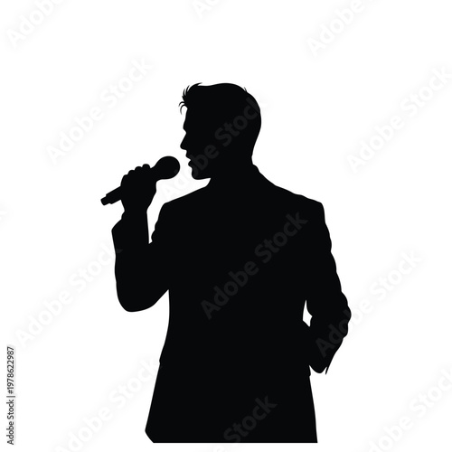 Silhouette of a man in a suit holding a microphone, ready to speak or sing on stage