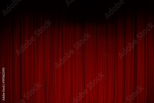 Fotografía Red curtain at the theater during a show before the performance starts in the ev