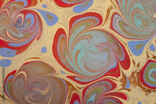 Vibrant psychedelic floral Ebru marbling art background with swirling liquid paint textures
