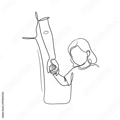 A girl touching a tree branch