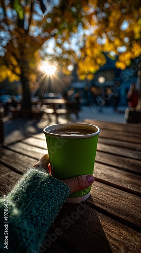 Sipping warm coffee under golden autumn sunlight