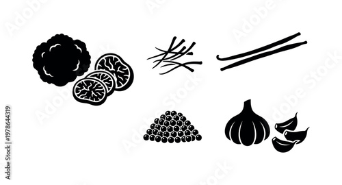 Truffle mushrooms whole and sliced pieces, saffron threads small strands, vanilla pods long sticks, caviar pearls in small mound,