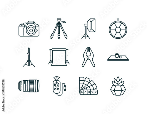 A product photoshoot scene with a camera, tripod, softbox, reflector, light stand, backdrop, clamp, tabletop, camera lens, remote