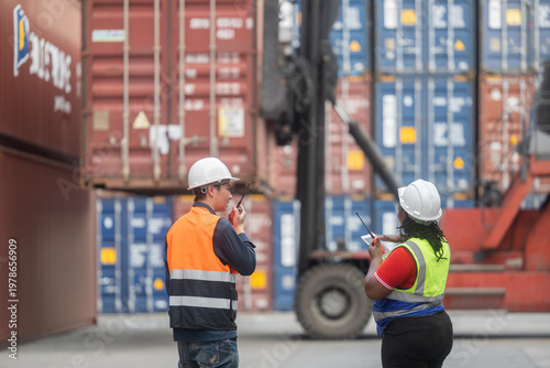 Workers coordinating container handling at port