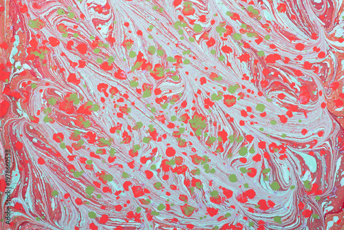 Colorful abstract Ebru marbling background with vibrant liquid ink swirls