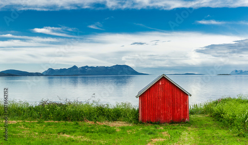 Red house on a fjord in Norway
