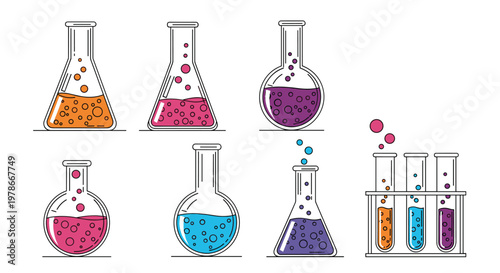 Set of various laboratory flasks and test tubes containing colorful bubbling chemical liquids for science concepts.