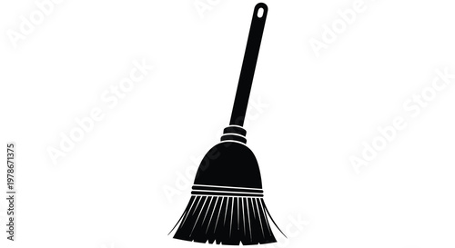 A simple black silhouette of a broom leaning against a white background