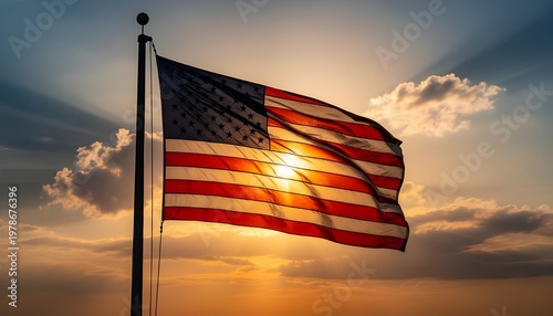 American Flag Waving in the Sunset Sky with Sun Rays Shining Through