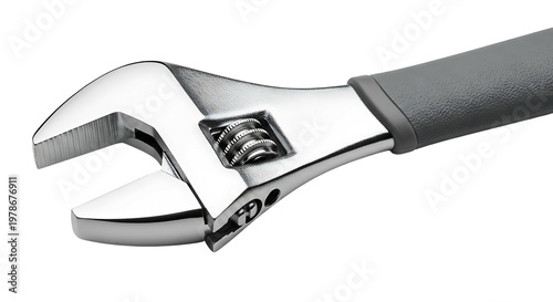 Close-up of a chrome adjustable wrench isolated on black