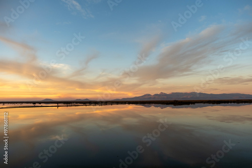 A reflective view of Algöl Lake in Ereğli, Konya, at sunset.
