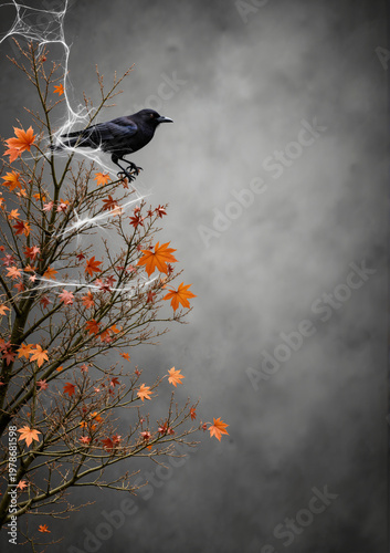 Black crow perched on branch with autumn leaves for Halloween  