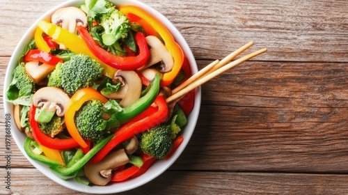 Vibrant Vegetable Medley in a White Bowl with Chopsticks on a Rustic Wooden Tabletop