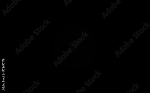 The appearance of light, the sun, dawn. Smooth appearance of light on a black background. Light in 4k resolution.