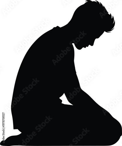 Silhouette of a man kneeling in despair with head bowed down, representing sadness, grief, depression, loss, and lonely emotional pain.
