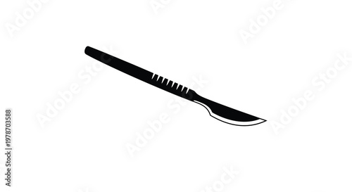 A black scalpel blade shown diagonally against a white background