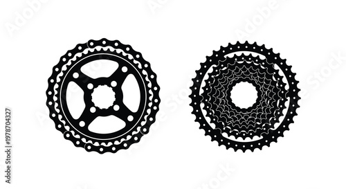 Black and white illustration of two bicycle sprockets with detailed teeth