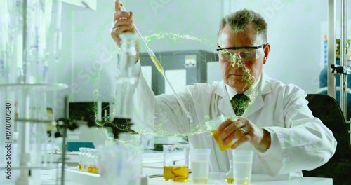 Handling scientist pipetting yellow liquid at lab bench in lab coat, tie, goggles, neon-green glow