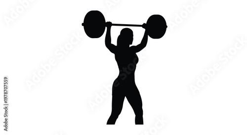 Silhouette of a weightlifter successfully completing a clean and jerk