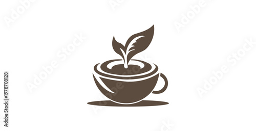 A brown coffee cup with a green leaf growing out of it