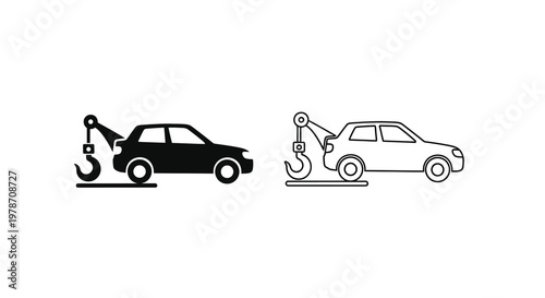 Two tow truck icons one black filled one white outline on a white background