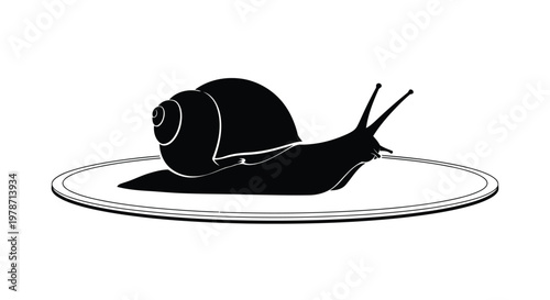 Black silhouette of a snail on a plate