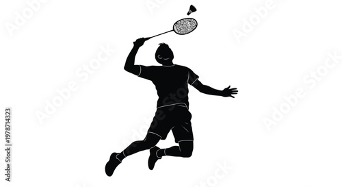 Silhouette of a man playing badminton with racket and shuttlecock