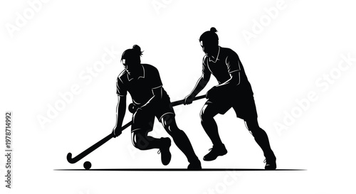 Two field hockey players in action on a competing for the ball