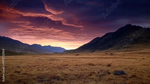 Breathtaking Sunset Over Majestic Mountains with Dramatic Clouds and Vibrant Sky Colors in Scenic Landscape