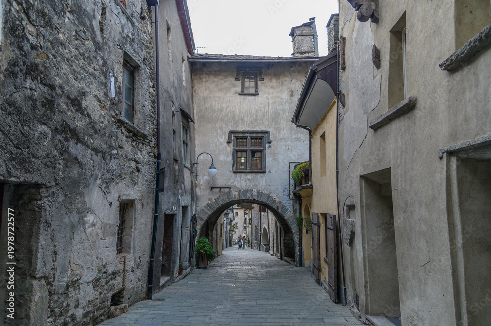 Fototapeta premium Stone Archway over a Village Street in Bard, Italy