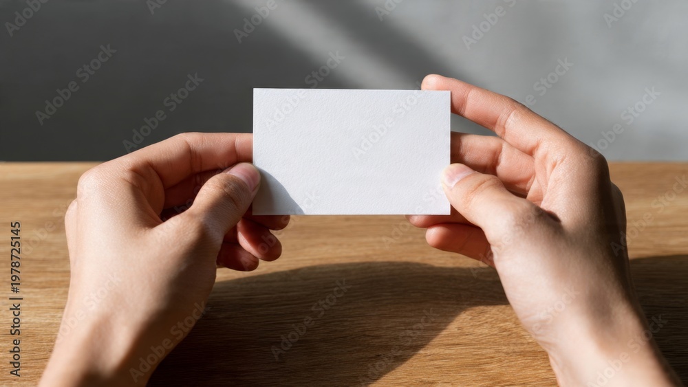 Obraz premium Minimalist business card placement on table top view blank card aesthetic professional environment creative concept