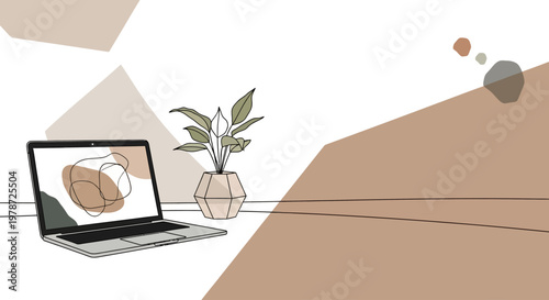 Minimalist home office workspace with laptop and plant