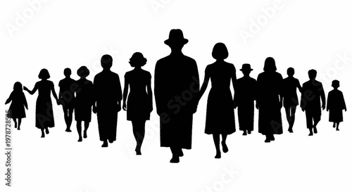Silhouettes of people walking together in a group.