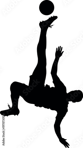 Silhouette of a soccer player performing a bicycle kick with a ball