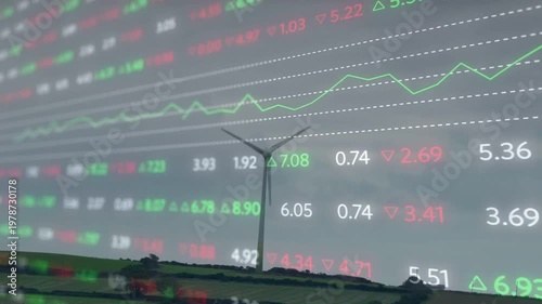 Rotating single three-blade wind turbine turning at rural horizon, with financial market overlay
