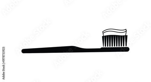 A black silhouette of a toothbrush against a stark white background silhouette