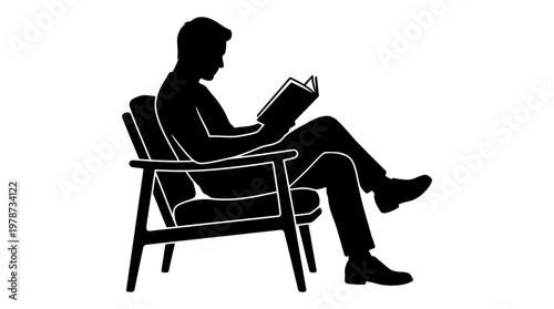 Man sitting in chair reading book.