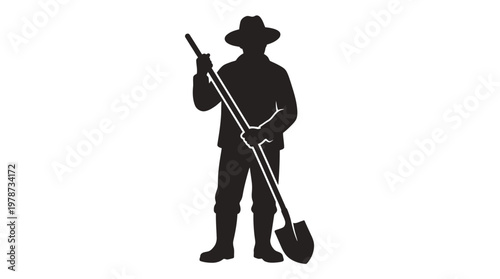 Man wearing a hat holding shovel.