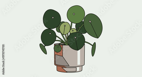 A potted plant with green leaves.
