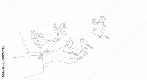Birds flying around a human hand.