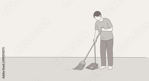 Man sweeping floor with a broom.
