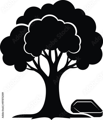 Stylized black silhouette of a tree with a small vehicle