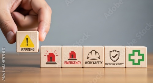 Workplace safety wooden blocks with warning icons, occupational health and safety management concept, emergency and protection security symbols