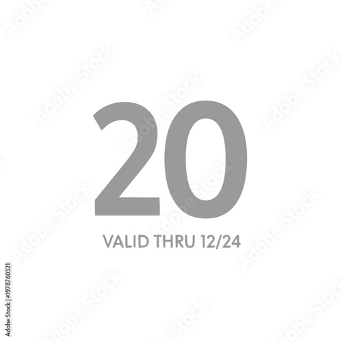 A close-up view of a large number twenty with expiration date on a white background